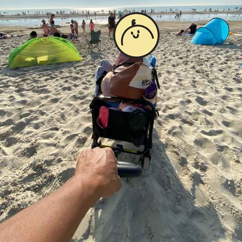 beach wagon with a child inside